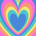 The largest heart is pink, followed by orange, yellow, light green, teal, and finally a central blue heart. Royalty Free Stock Photo